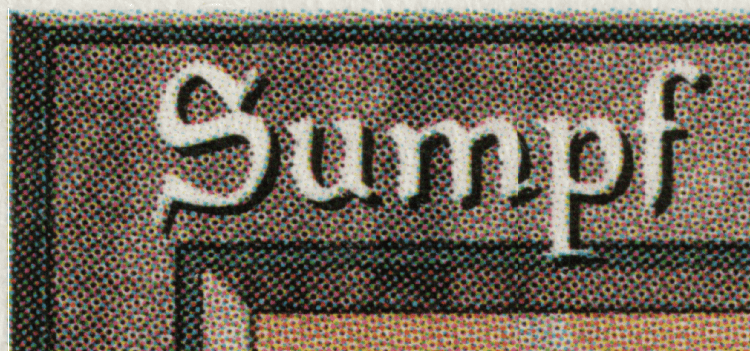 Yet another highly magnified view of the top-left corner of a German Swamp card.