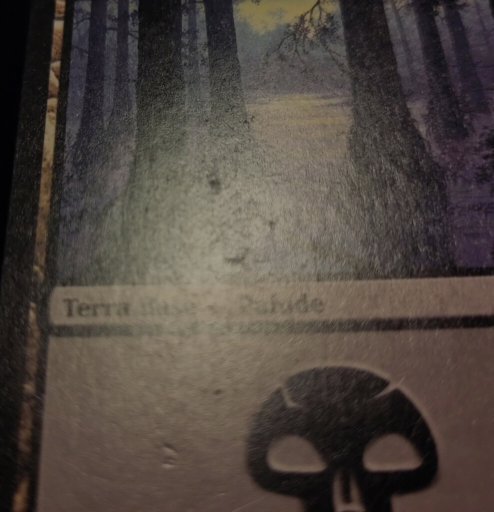 Surface imperfections on card front.