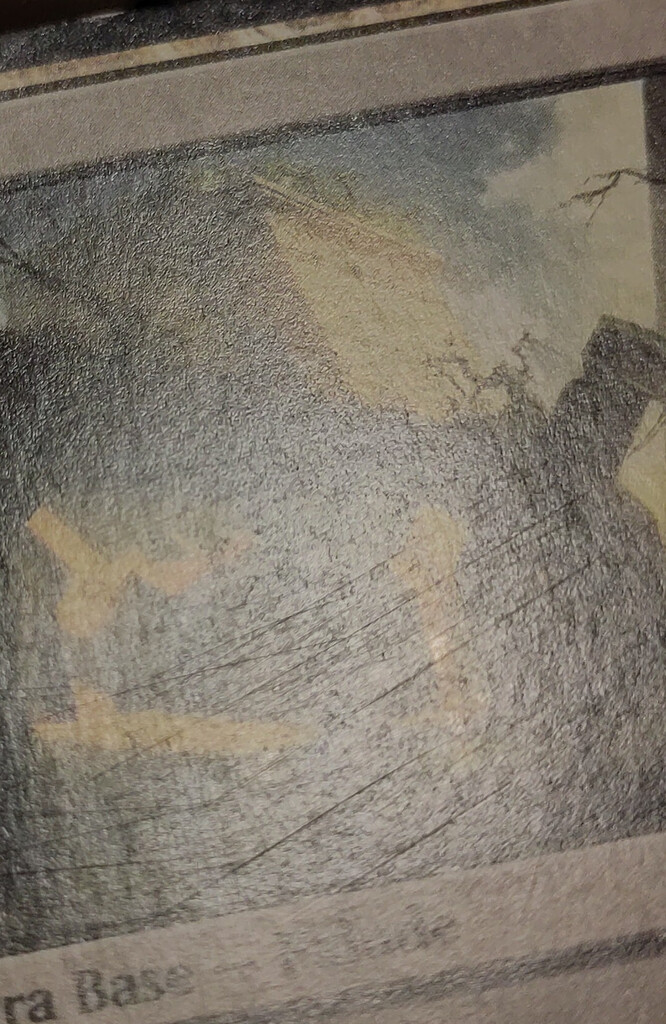 Different angle of the same scratches.