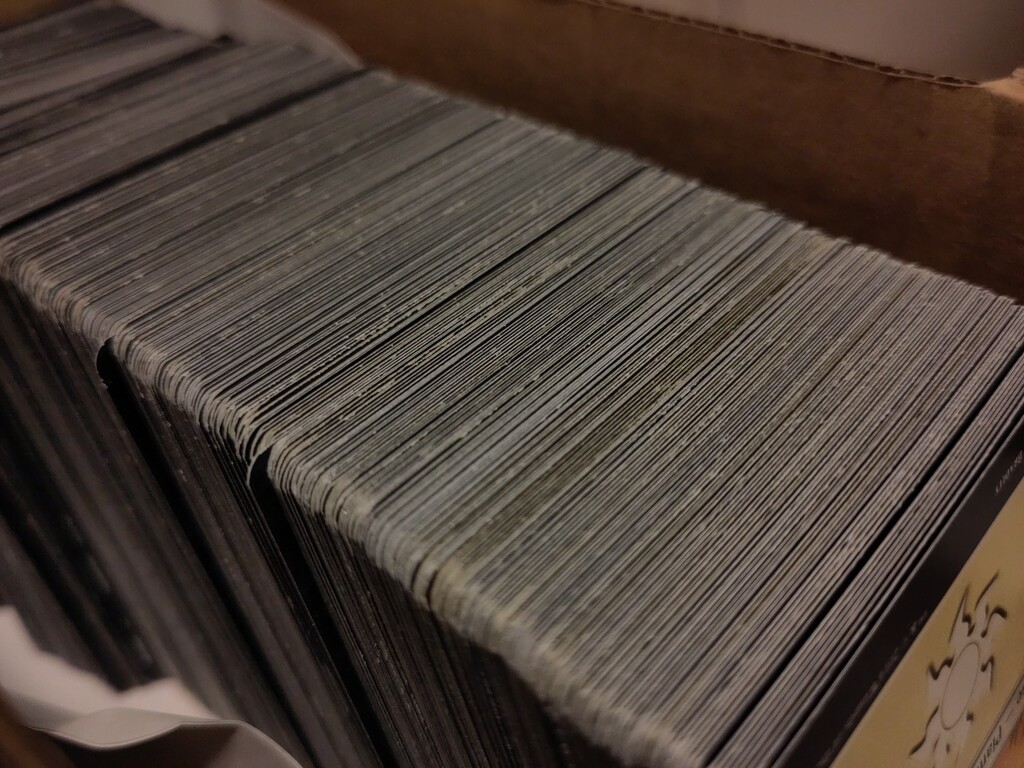 Another view of the top edges of the same stack of cards.