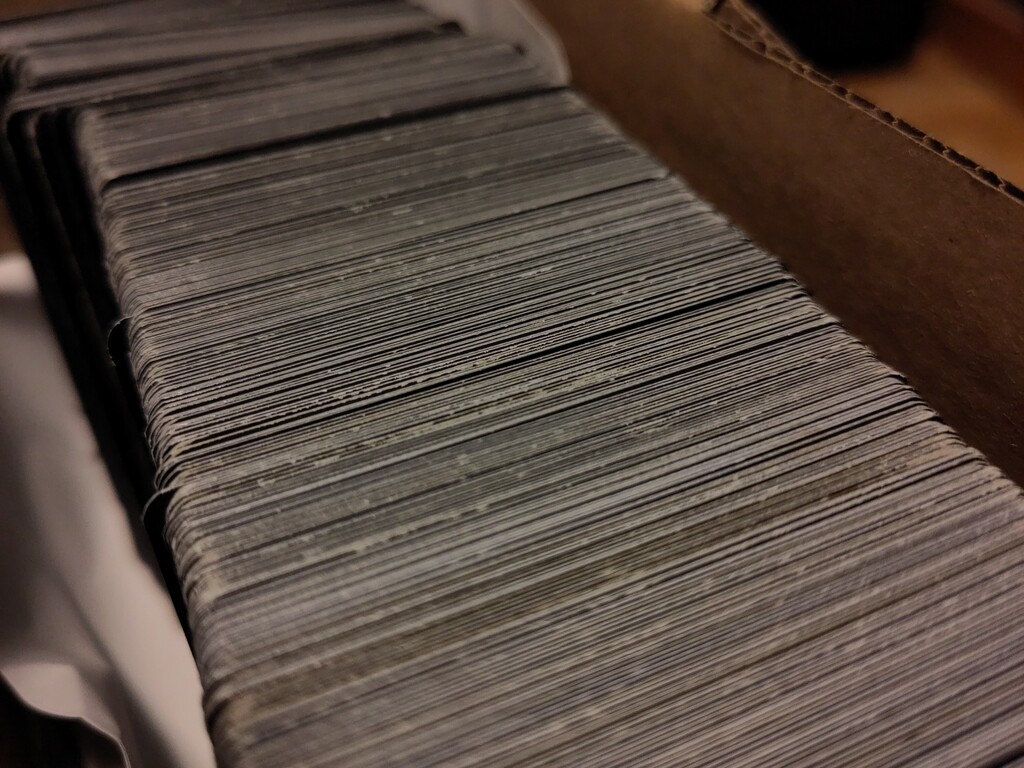 A view of the top edges of a stack of cards.